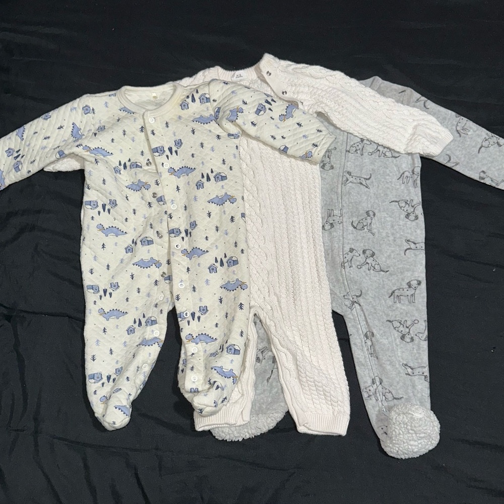 Lot of Cozy onesies for baby
